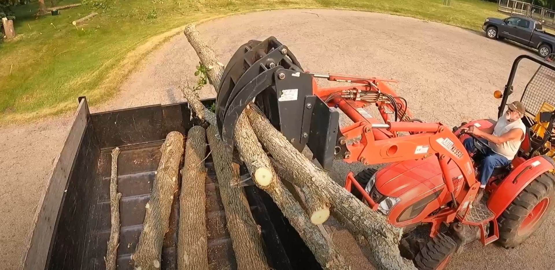 East Orange Tree Service - Professional equipment and expertise Professional tree service equipment and logs being loaded